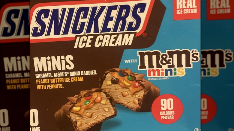 A box of Snickers Ice Cream Minis with mini M&Ms
