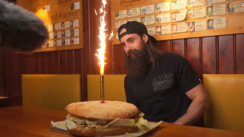 Adam Moran with the XXL burger challenge
