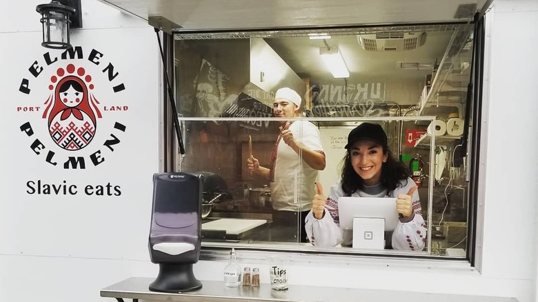 Person in food truck window