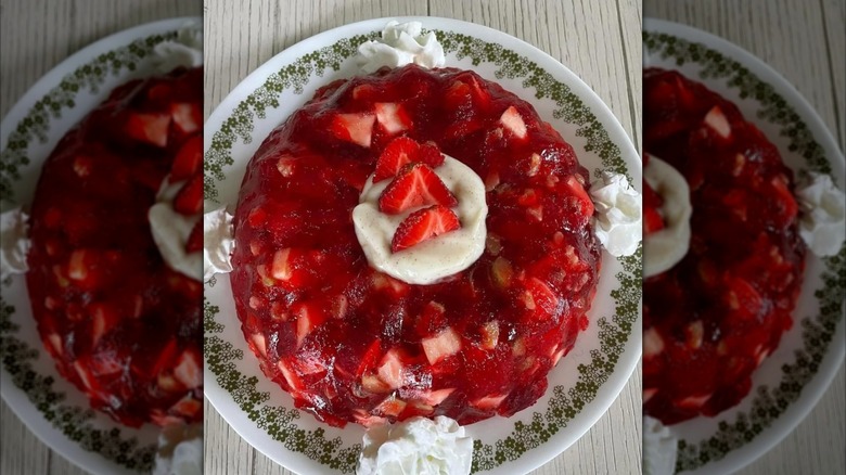 Mirrored image of jello salad with strawberries