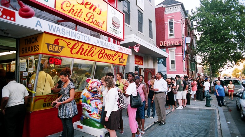 People lined up outside the original Ben's Chili Bowl