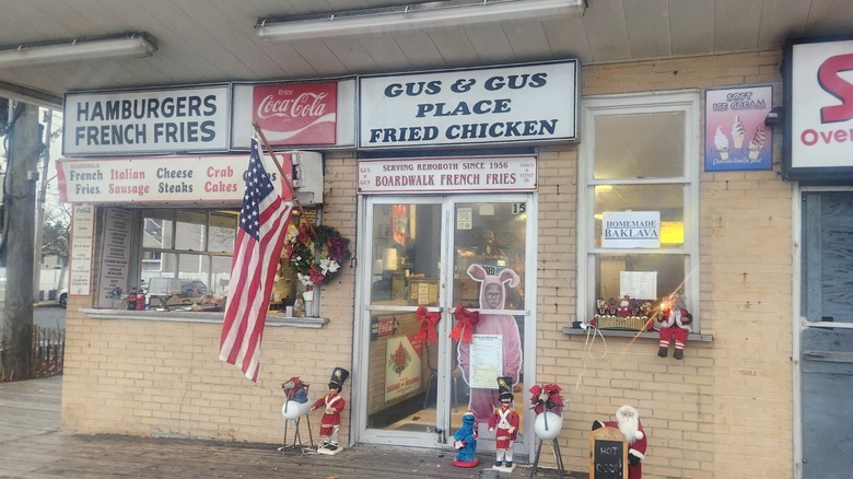 Exterior of Gus & Gus Place with open walk-up window