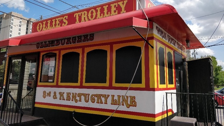 Exterior of Ollie's Trolley yellow, red, and white trolley car turned restaurant