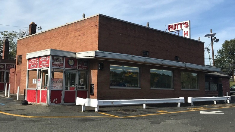 Exterior of Rutt's Hutt brick building with side entrance