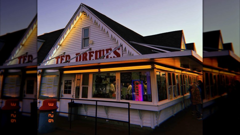 Exterior of Ted Drewes white building with wrap-around windows