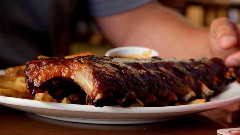 Rack of baby back ribs with sauce from from Outback Steakhouse