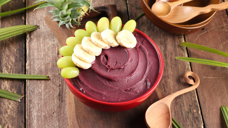 Açai bowl with grapes and banana slices