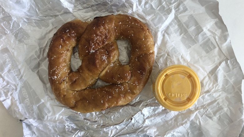 Sheetz salted pretzel with cup of nacho cheese.