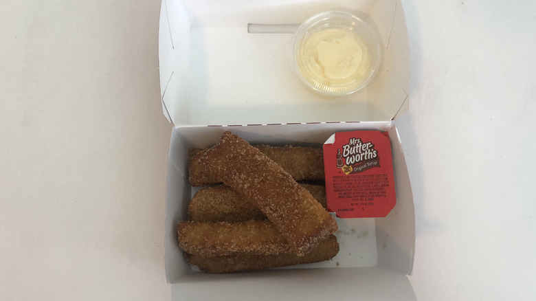 Sheetz French toast sticks with syrup and Cinnabon frosting.