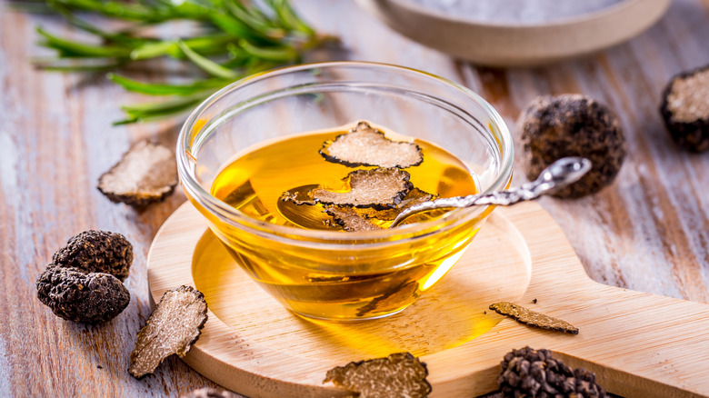 Truffle oil in small bowl with spoon