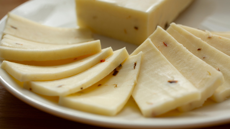 Slices of pepper jack cheese on plate