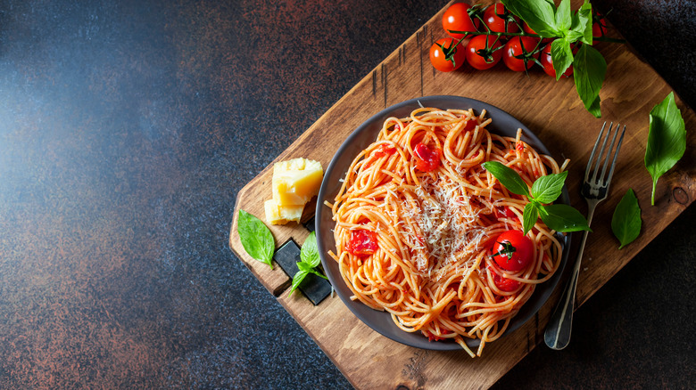 dish of spaghetti and tomatoes