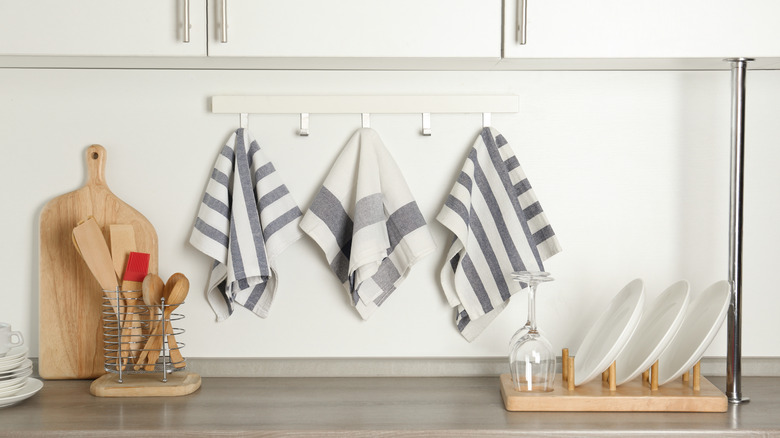 Decorative kitchen hand towels under cabinets