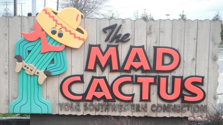 The Mad Cactus sign with an image of a cactus dressed up as a cowboy