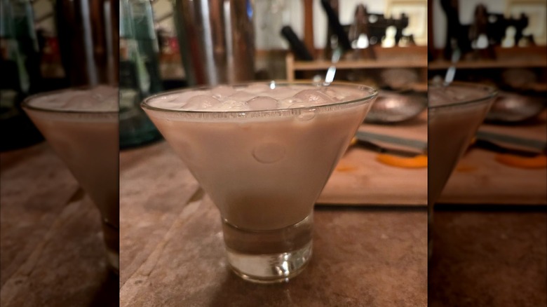 Mirrored image of screaming orgasm cocktail close up with kitchen in background