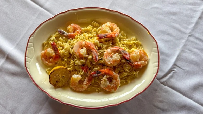 Maggiano's shrimp scampi in bowl on white tablecloth