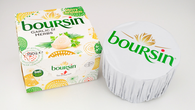 Packet of garlic and herb Boursin cheese