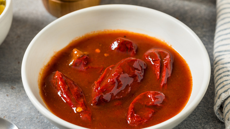 Bowl of chipotle peppers in adobo sauce