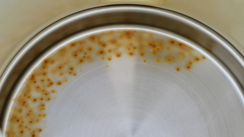 Rust patches in base of pan