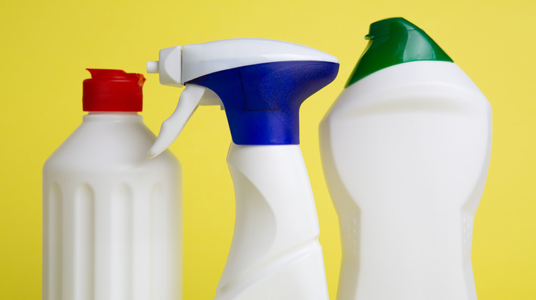 Unlabeled bottles of cleaning products