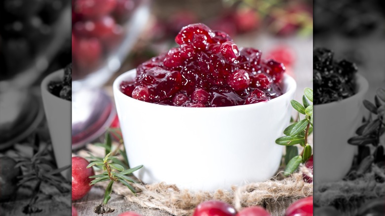 Close up of cranberry sauce in a white ramekin