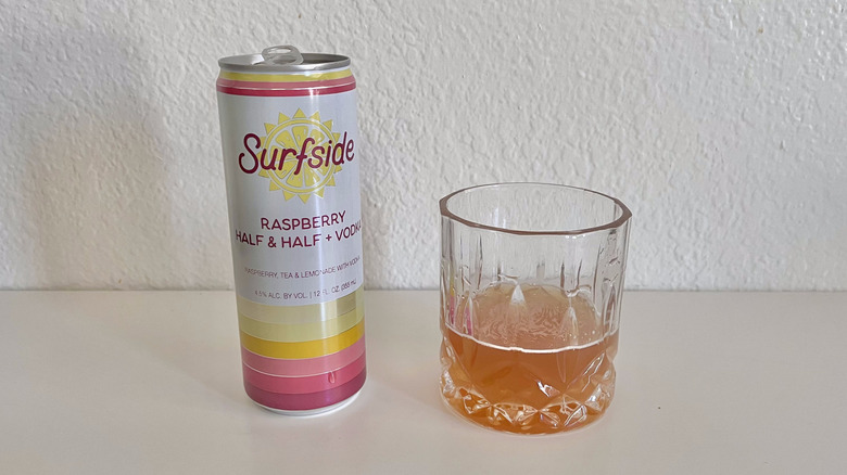Raspberry Half & Half + Vodka poured into a glass