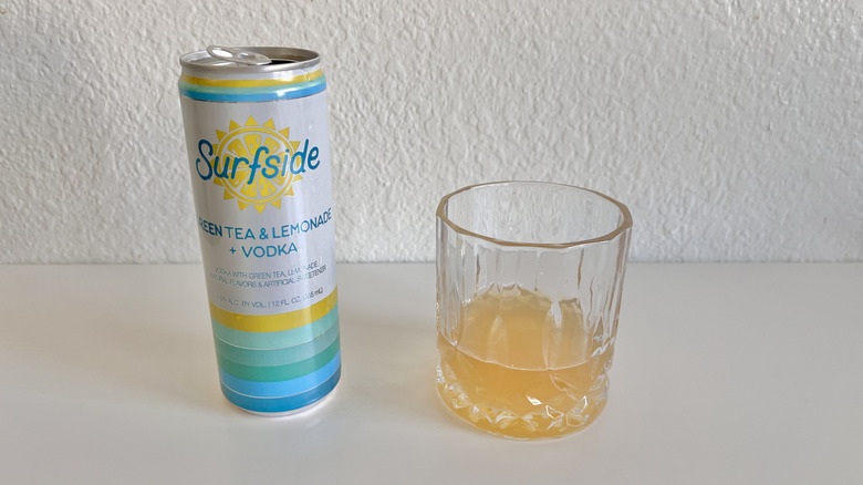 Green Tea Lemonade + Vodka poured into a glass