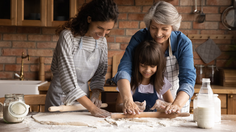 three generations of women baking