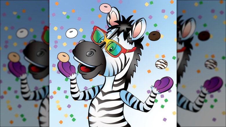 Zain the zebra juggling mini donuts