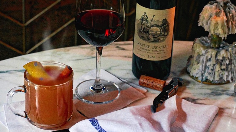 table with cocktail and wine