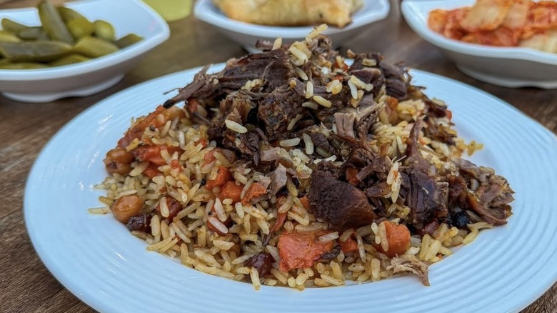 rice dish piled high with meat