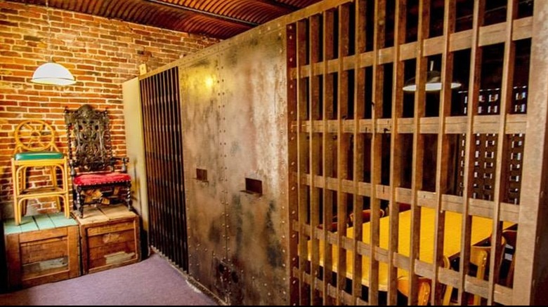 Jail cell dining area inside of Jailhouse Pizza