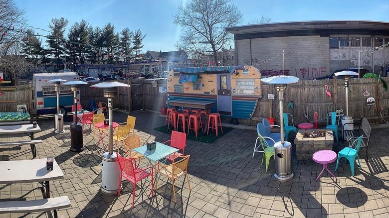 The outdoor dining area of Ogie's Trailer Park
