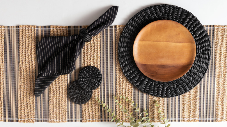 Table setting on a striped jute runner