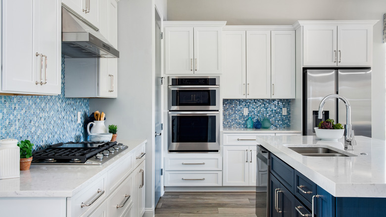 Luxury kitchen interior with blue tiled backsplash