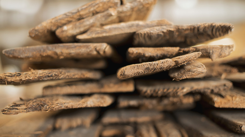 Several planks of wood stacked together