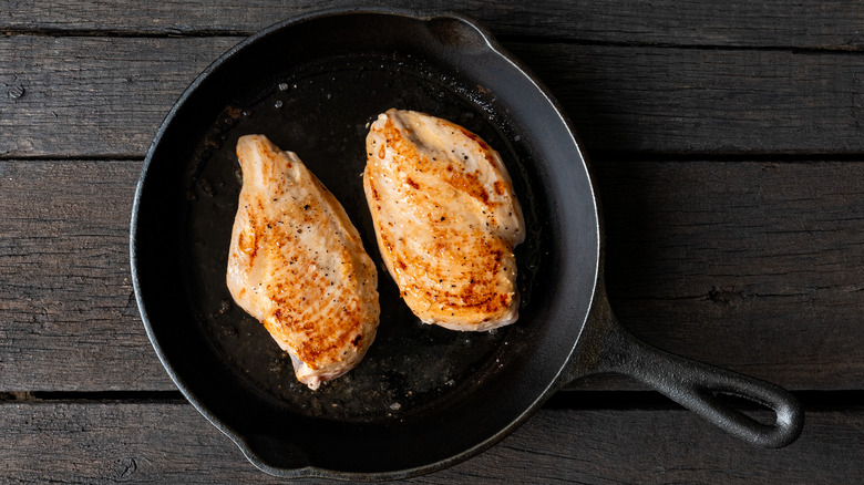 Two seared chicken breasts