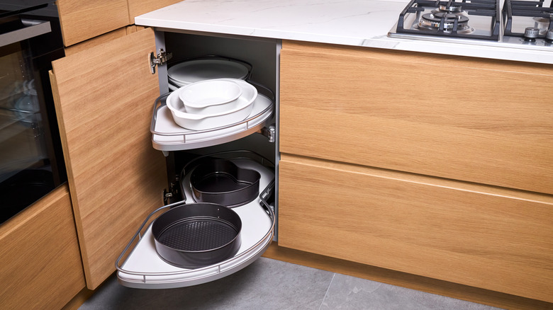 Corner unit with pull out shelves for cookware