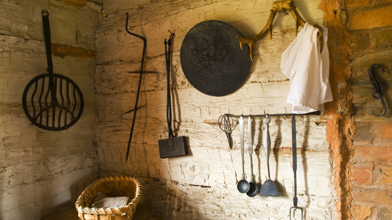 rusting cooking utensils in corner