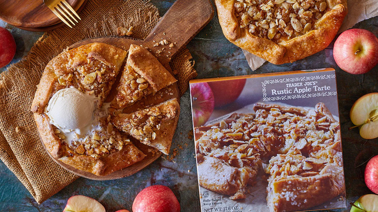 Trader Joe's Rustic Apple Tarte baked, sliced, and served on board next to box