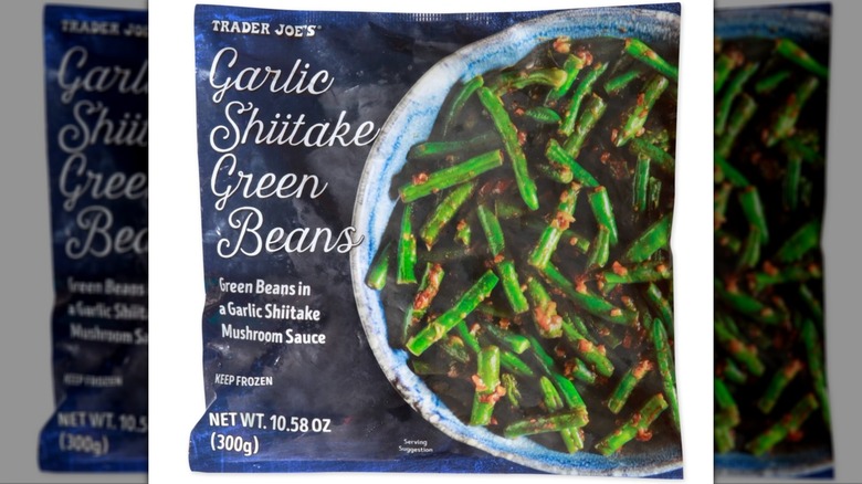 Bag of garlic shiitake green beans from Trader Joe's on white background