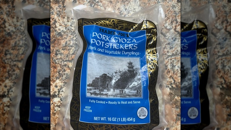 Bag of Trader Joe's Pork Gyoza potstickers on granite countertop