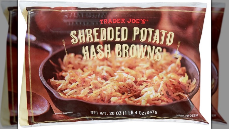 Bag of Trader Joe's shredded potato hash browns on white background