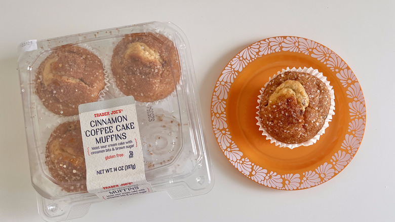 Top view of coffee cake muffins from Trader Joe's with one muffin served on a plate