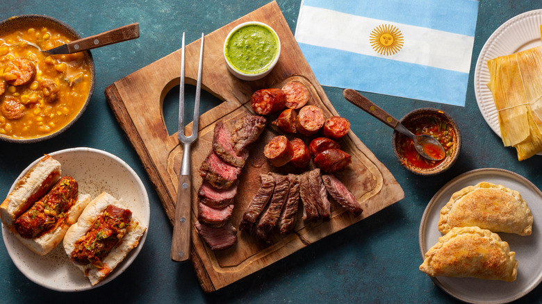 Spread of traditional Argentinian food with Argentinian flag