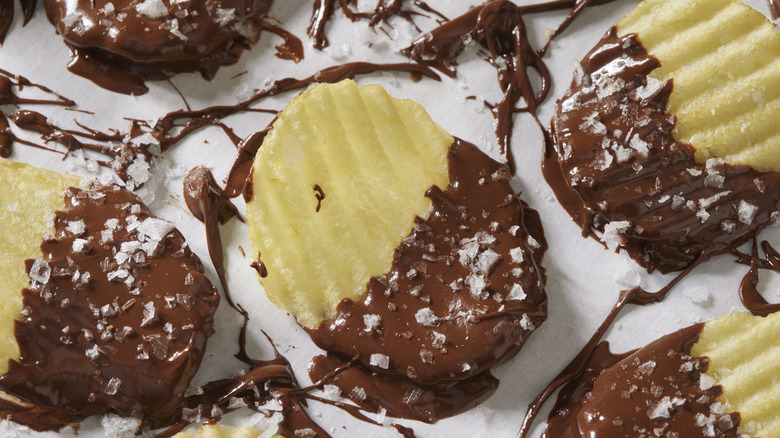 Potato chips dipped in chocolate and sprinkled with salt.