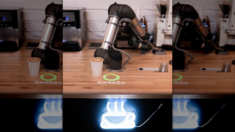 artly barista bot next to latte