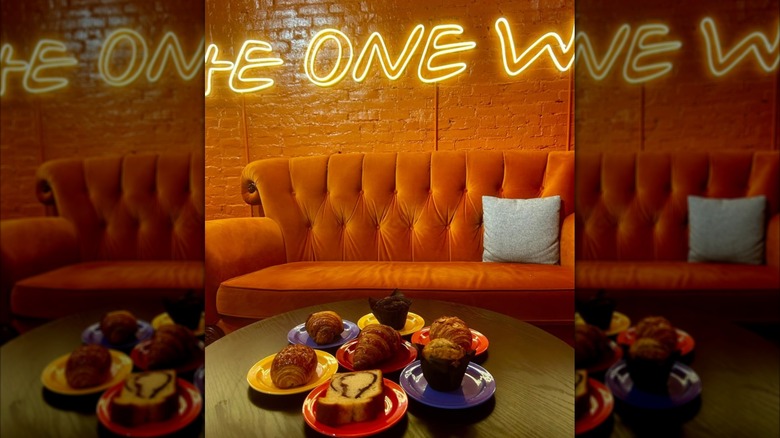 central perk orange couch and pastries