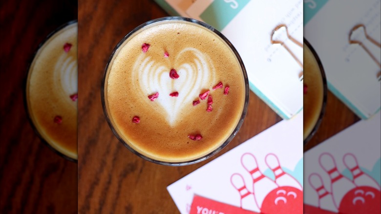 latte next to bowling invitation