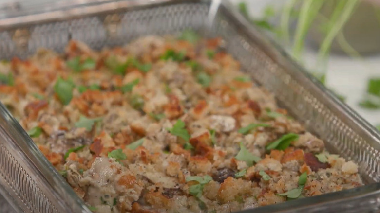 Oyster casserole with breadcrumb topping and parsley garnish